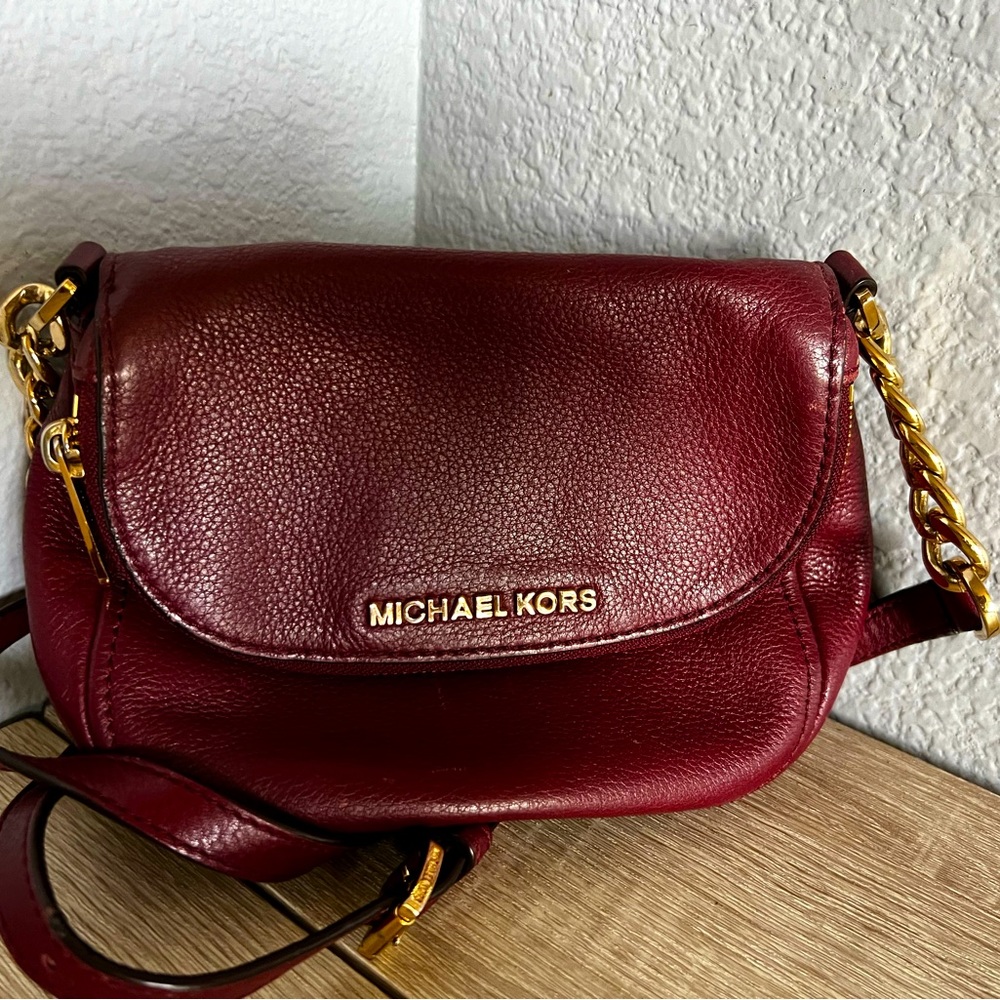 Michale Kors Burgundy crossbody bag. Small